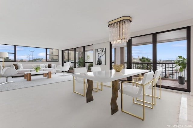 dining space with a chandelier