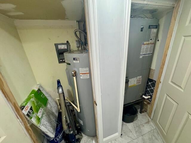 utility room featuring gas water heater