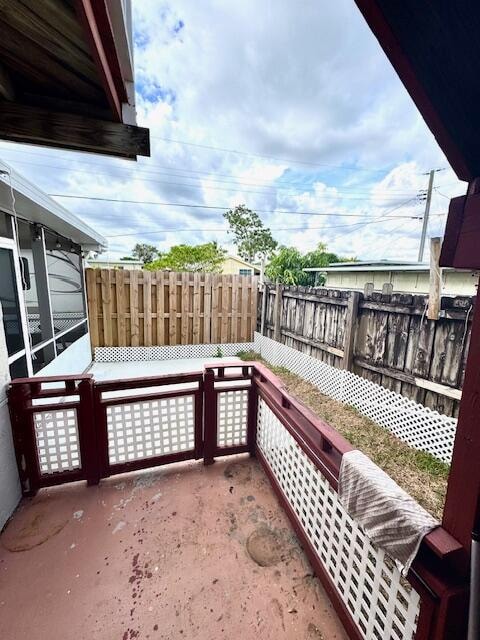 exterior space featuring a sunroom