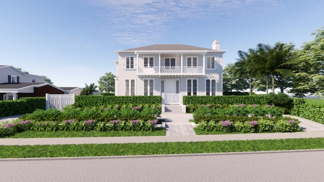 colonial inspired home with a balcony