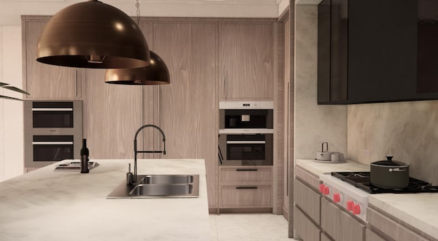 kitchen with decorative light fixtures, light brown cabinets, sink, and stainless steel appliances