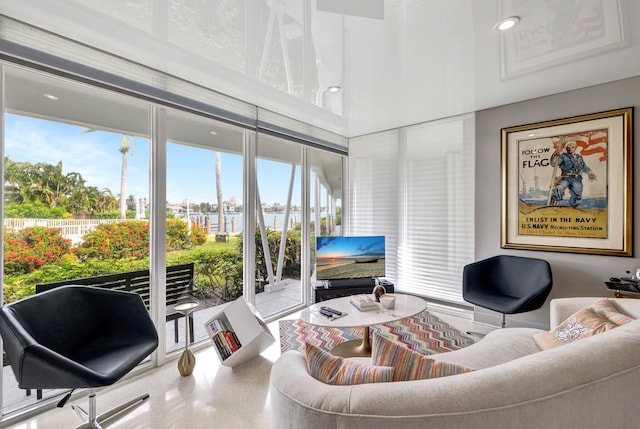 living room featuring a high ceiling