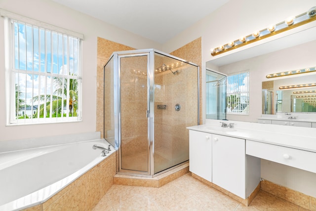 bathroom with vanity, tile patterned floors, and separate shower and tub