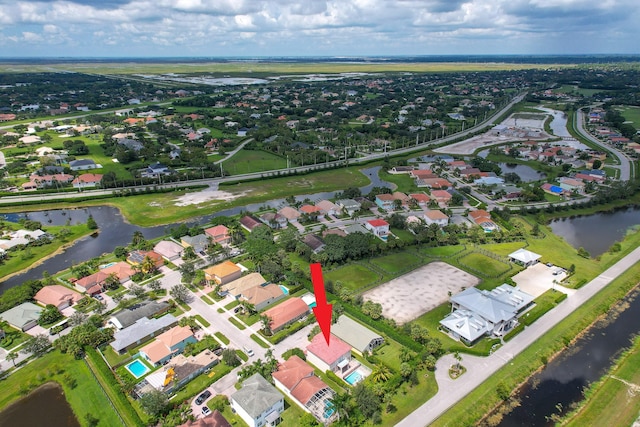 drone / aerial view featuring a water view