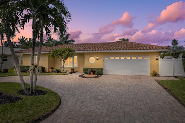 view of front of home with a garage