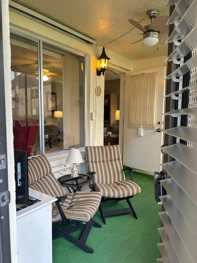 view of patio / terrace featuring ceiling fan