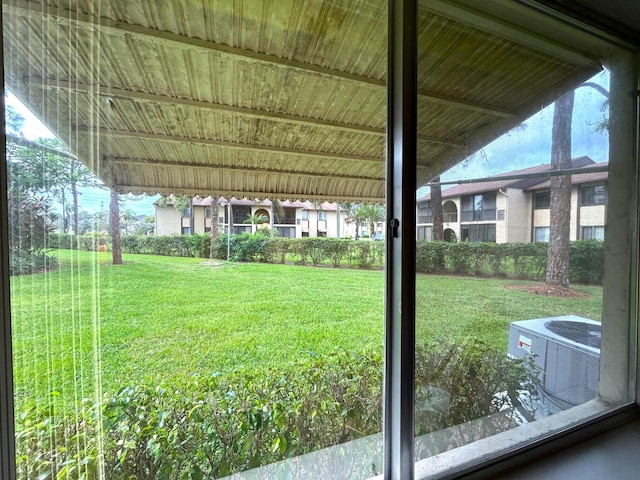 view of yard with central AC unit