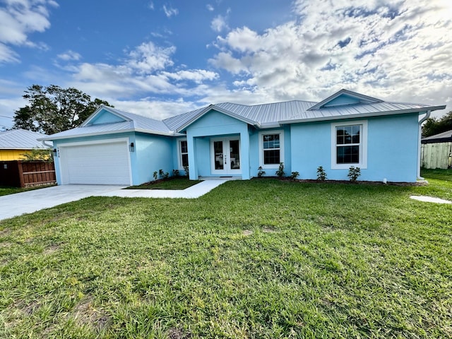 single story home featuring a front lawn and a garage