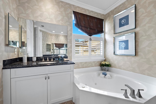 bathroom featuring a tub to relax in, vanity, and ornamental molding