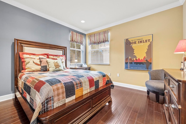 bedroom with dark hardwood / wood-style floors and crown molding