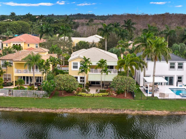 drone / aerial view with a water view