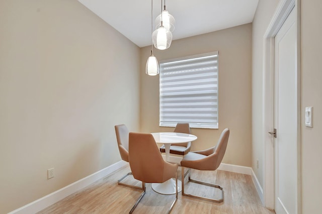 dining room featuring light hardwood / wood-style floors