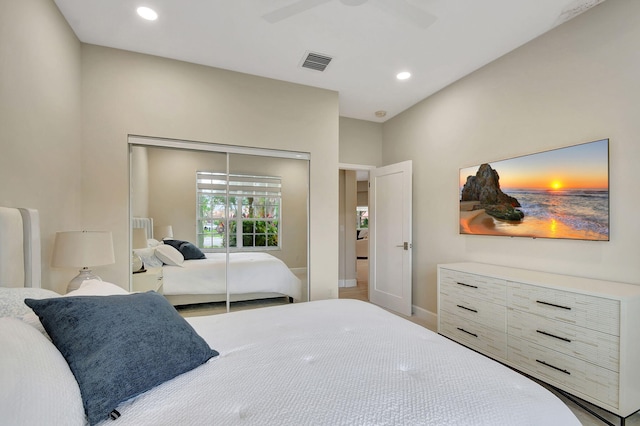 bedroom with ceiling fan and a closet