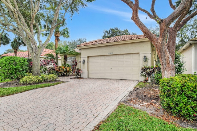 view of front of property featuring a garage