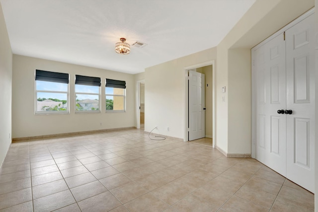 view of tiled spare room