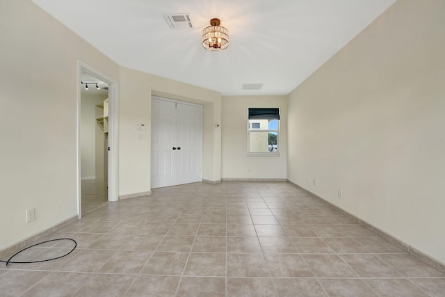 view of tiled empty room