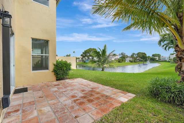 view of patio / terrace featuring a water view