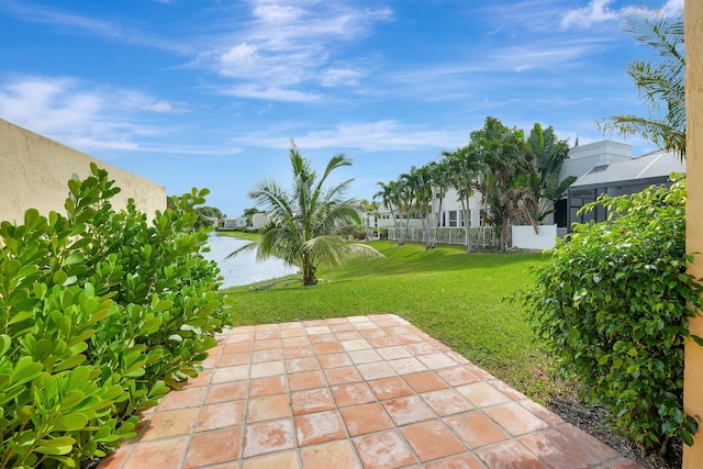 view of patio with a water view