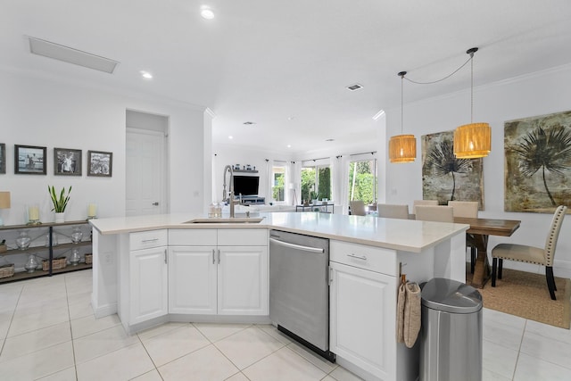 kitchen featuring dishwasher, white cabinetry, sink, and a center island with sink