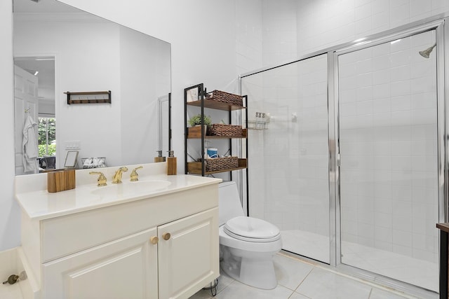 bathroom with toilet, an enclosed shower, vanity, and tile patterned flooring