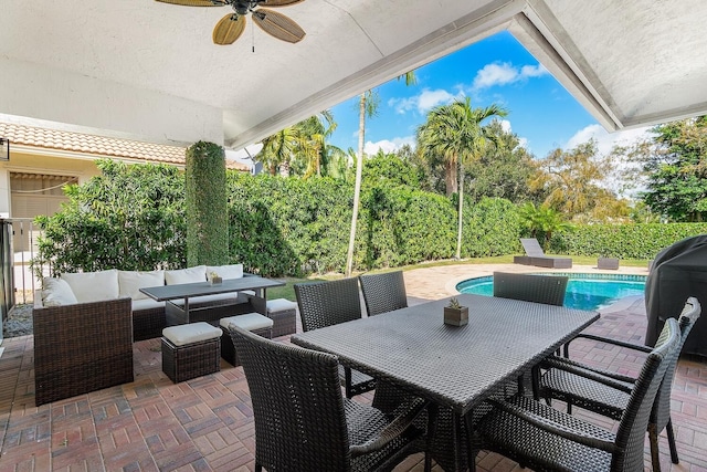 view of patio / terrace with a fenced in pool and an outdoor hangout area