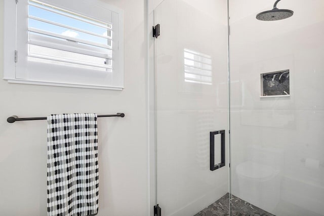 bathroom with an enclosed shower