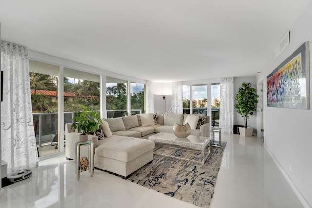 living room with light tile patterned floors