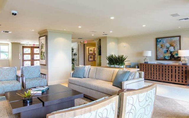 living room with ornamental molding