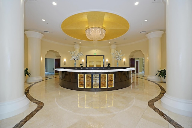 reception area with a notable chandelier