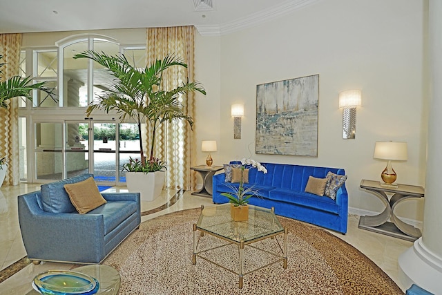 living room with ornamental molding