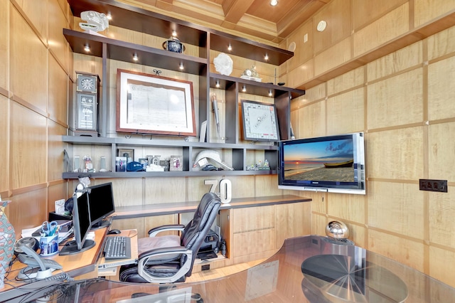 home office with beamed ceiling, wood walls, and coffered ceiling