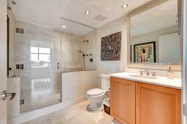 bathroom featuring toilet, tile patterned flooring, an enclosed shower, and vanity