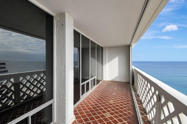 balcony featuring a water view