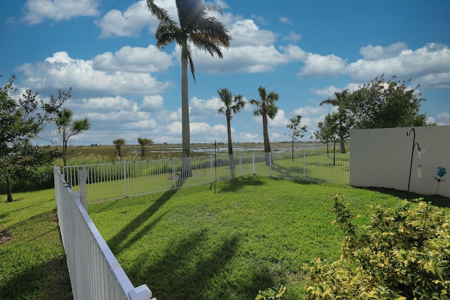 view of yard with a rural view