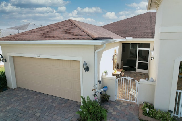 exterior space with a garage