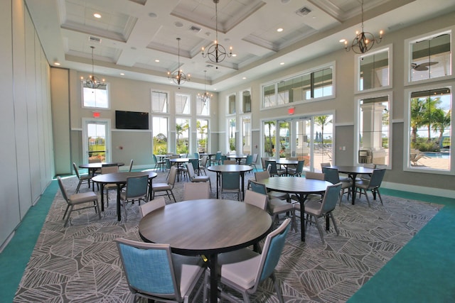 dining room featuring a high ceiling, beamed ceiling, coffered ceiling, and carpet