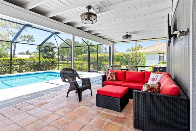 exterior space featuring ceiling fan, outdoor lounge area, and glass enclosure