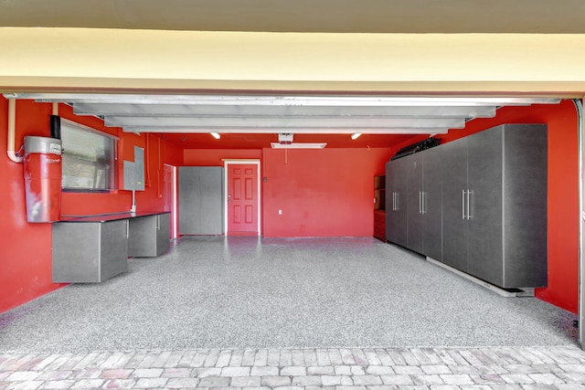 garage featuring a carport