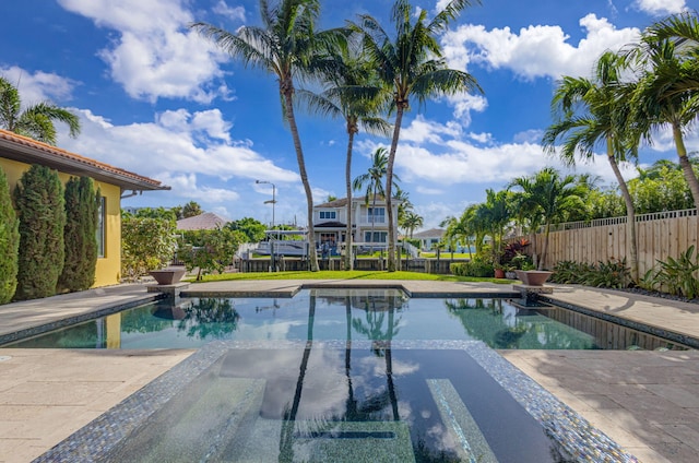 view of pool featuring a patio