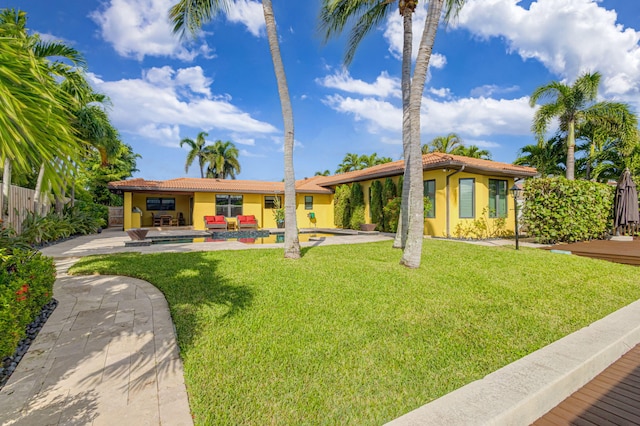 view of front of house with a front lawn