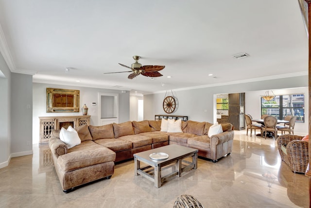 living room featuring ceiling fan and crown molding