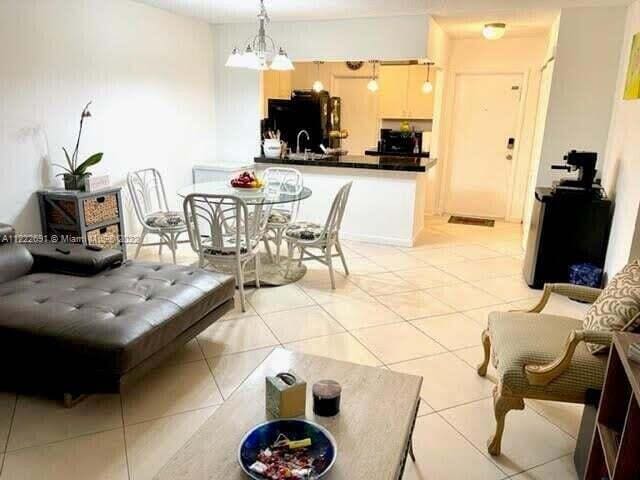 living room featuring light tile patterned floors