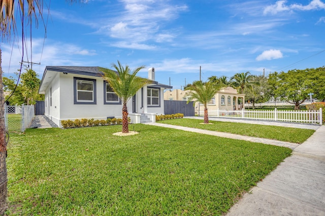 ranch-style house with a front yard