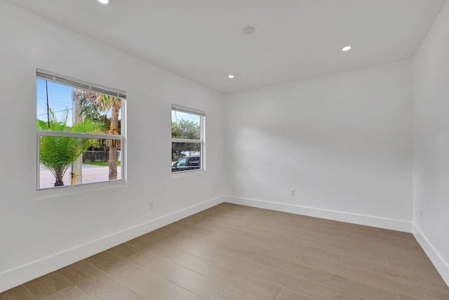 unfurnished room featuring light hardwood / wood-style flooring