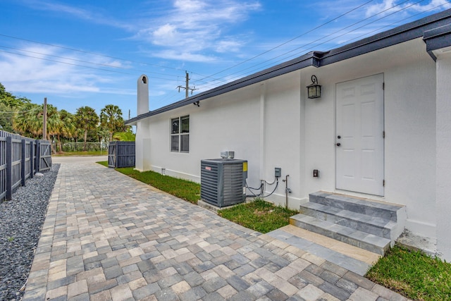 view of home's exterior featuring central AC unit