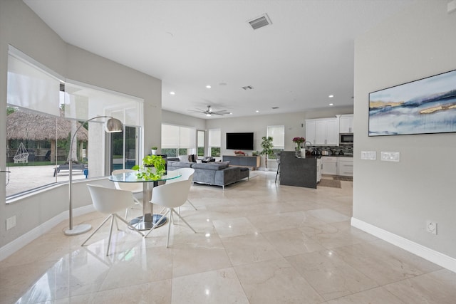 living room featuring ceiling fan