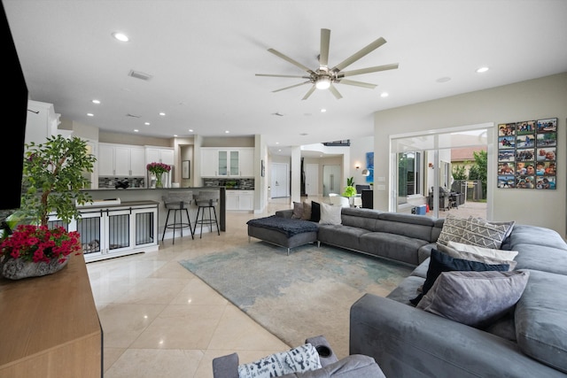 living room featuring ceiling fan