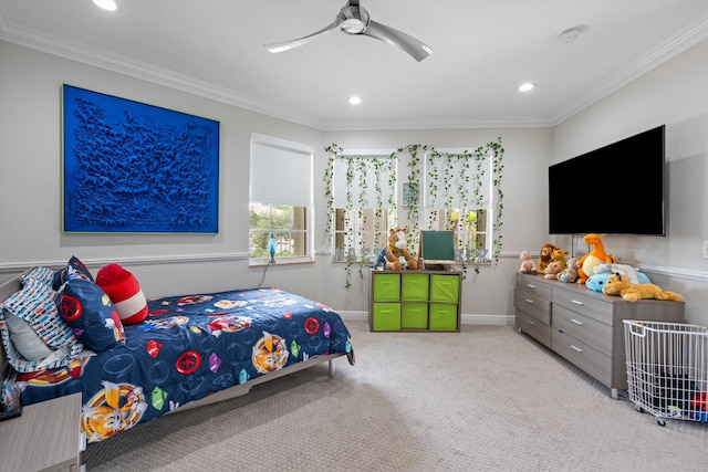 bedroom featuring ornamental molding, light colored carpet, and ceiling fan