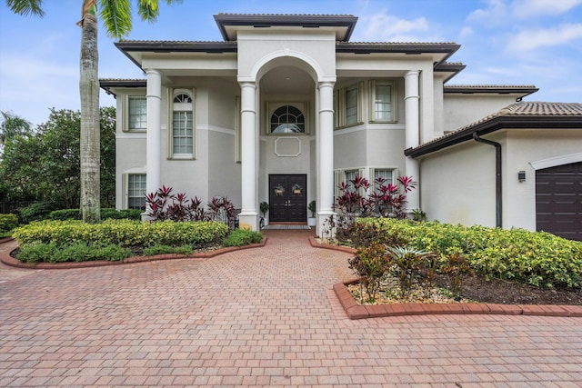 view of front of home with a garage