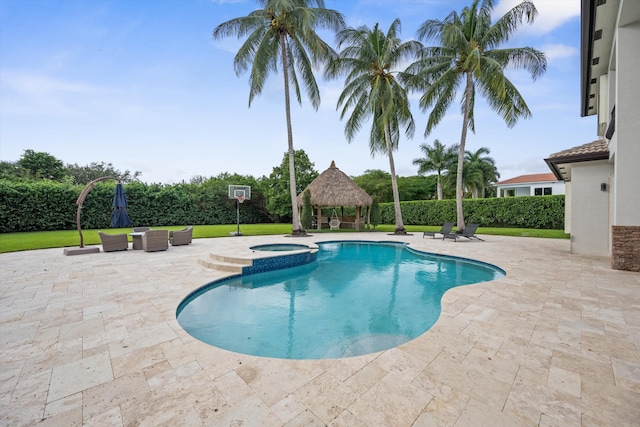 view of swimming pool with a patio area, a gazebo, and an in ground hot tub